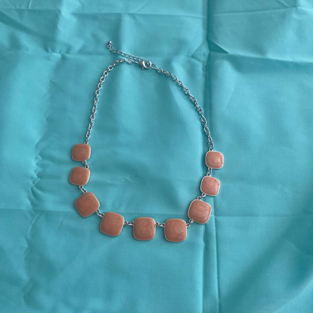 Silver necklace with beautiful peach color stones